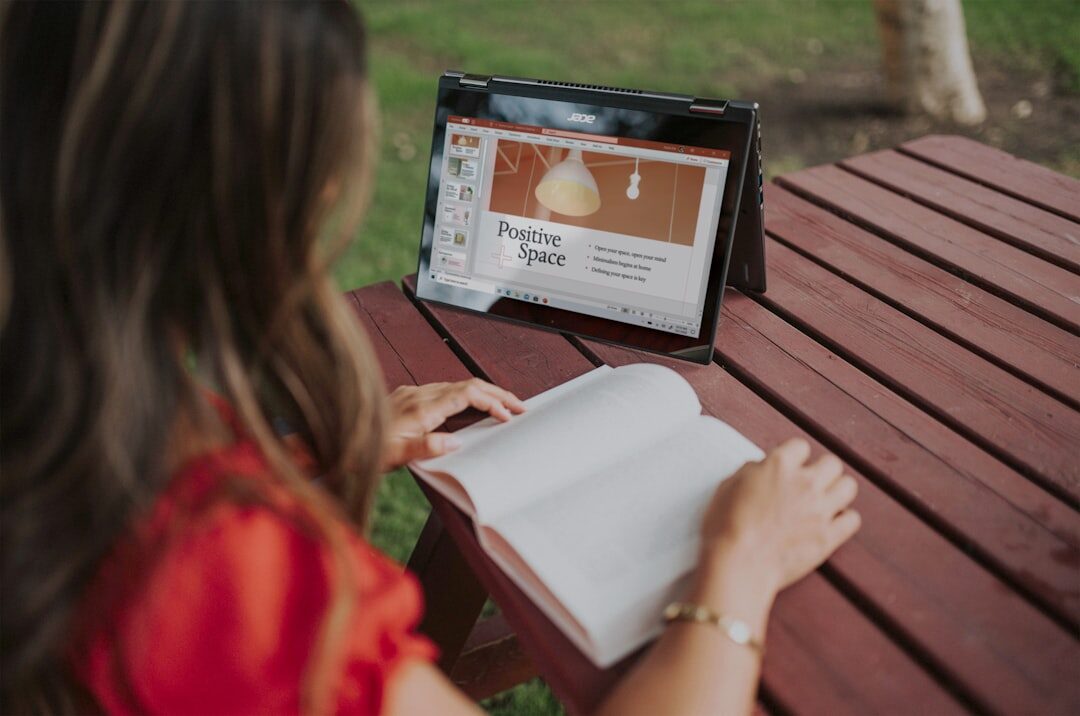 Person reading a research report digest on a tablet