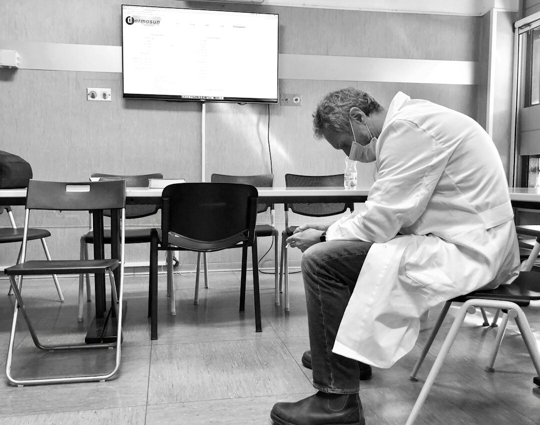 Researcher analyzing statistical charts on a whiteboard