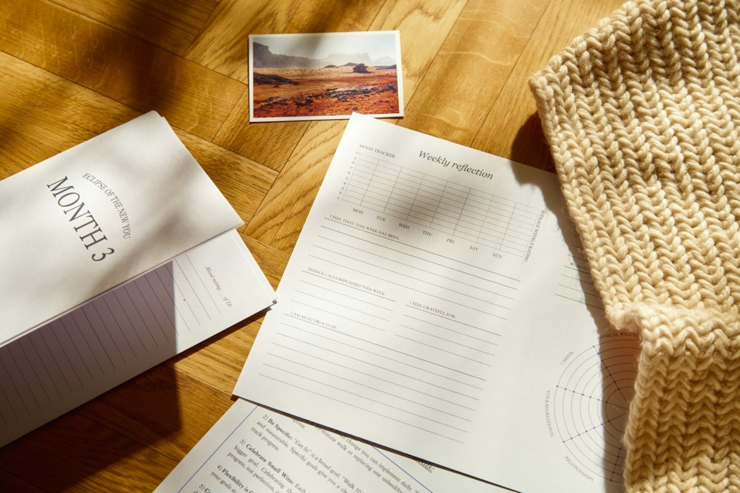 Overview of survey research reports and documents on a table